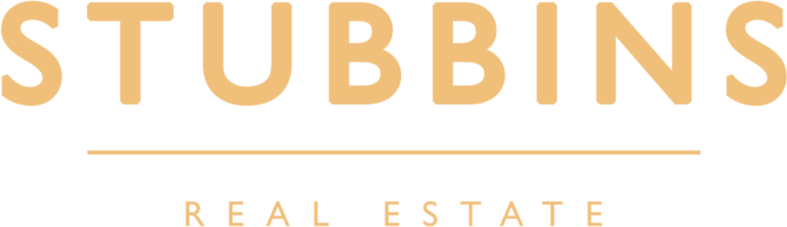Stubbins Real Estate Logo - Tan (1124x404), Png Download